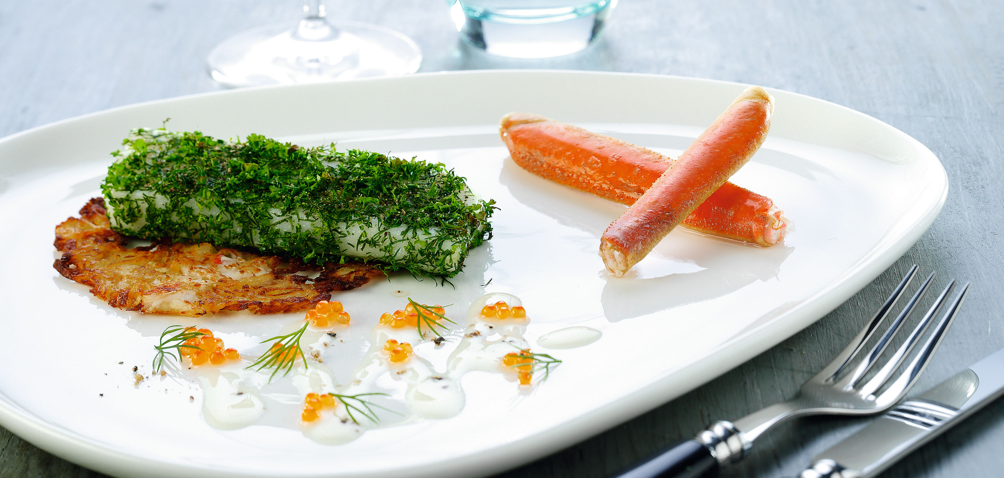 Herb-baked halibut fillet potatoes snow crabs and creamed salmon caviar - Greenland